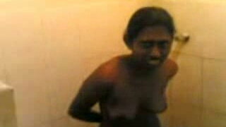 Dark skinned Sri Lankan roommate takes shower while I film her 
