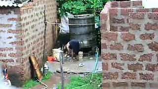 Watch this two hot Sri Lankan lady getting bath in outdoor 